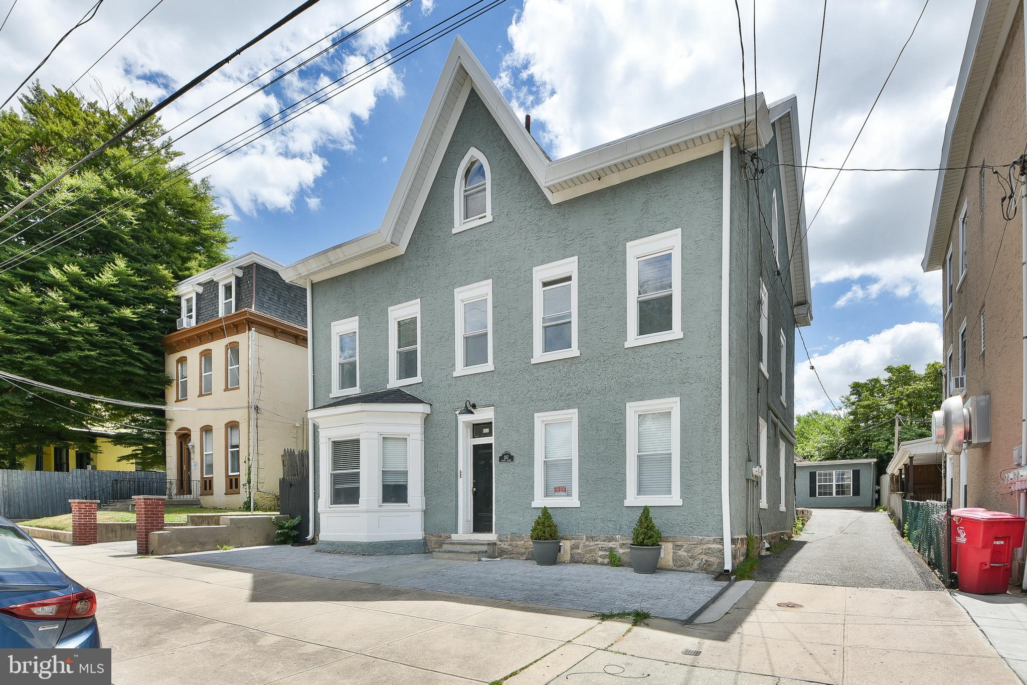 357 Lyceum Avenue Philadelphia, PA 19128 - Photo 5 of 21 a front view of a house with a garden