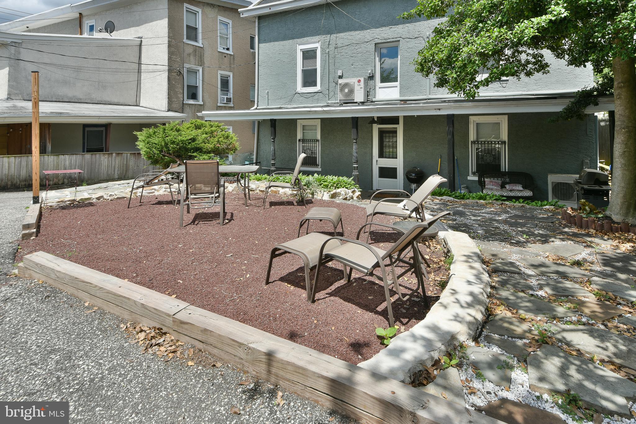 357 Lyceum Avenue Philadelphia, PA 19128 - Photo 7 of 21 a view of a house with backyard and sitting area