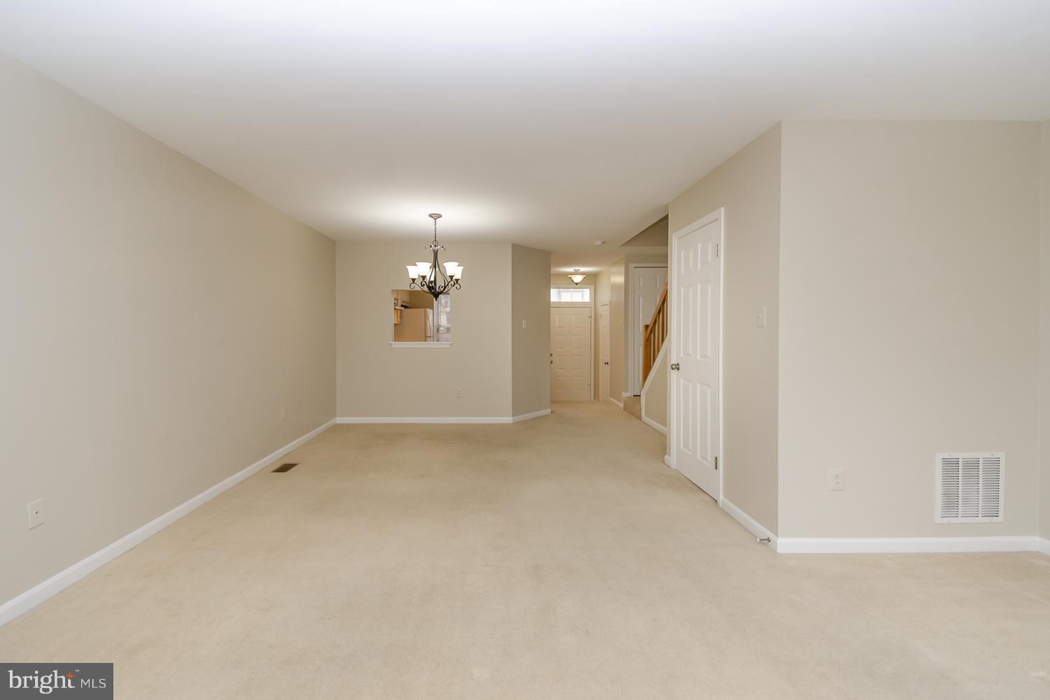 9502 Clocktower Lane Columbia, MD 21046 - Photo 6 of 12 a view of a big room with closet and windows