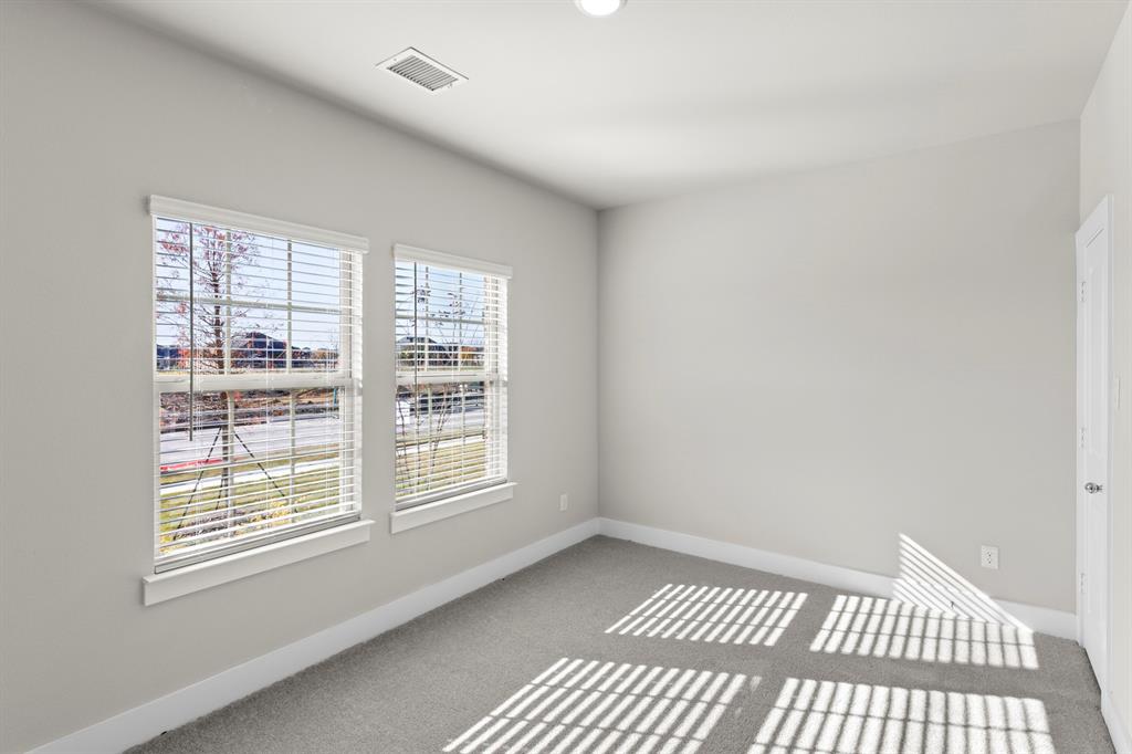 2372 Bell Way Forney, TX 75126 - Photo 10 of 39 a view of an empty room with a window