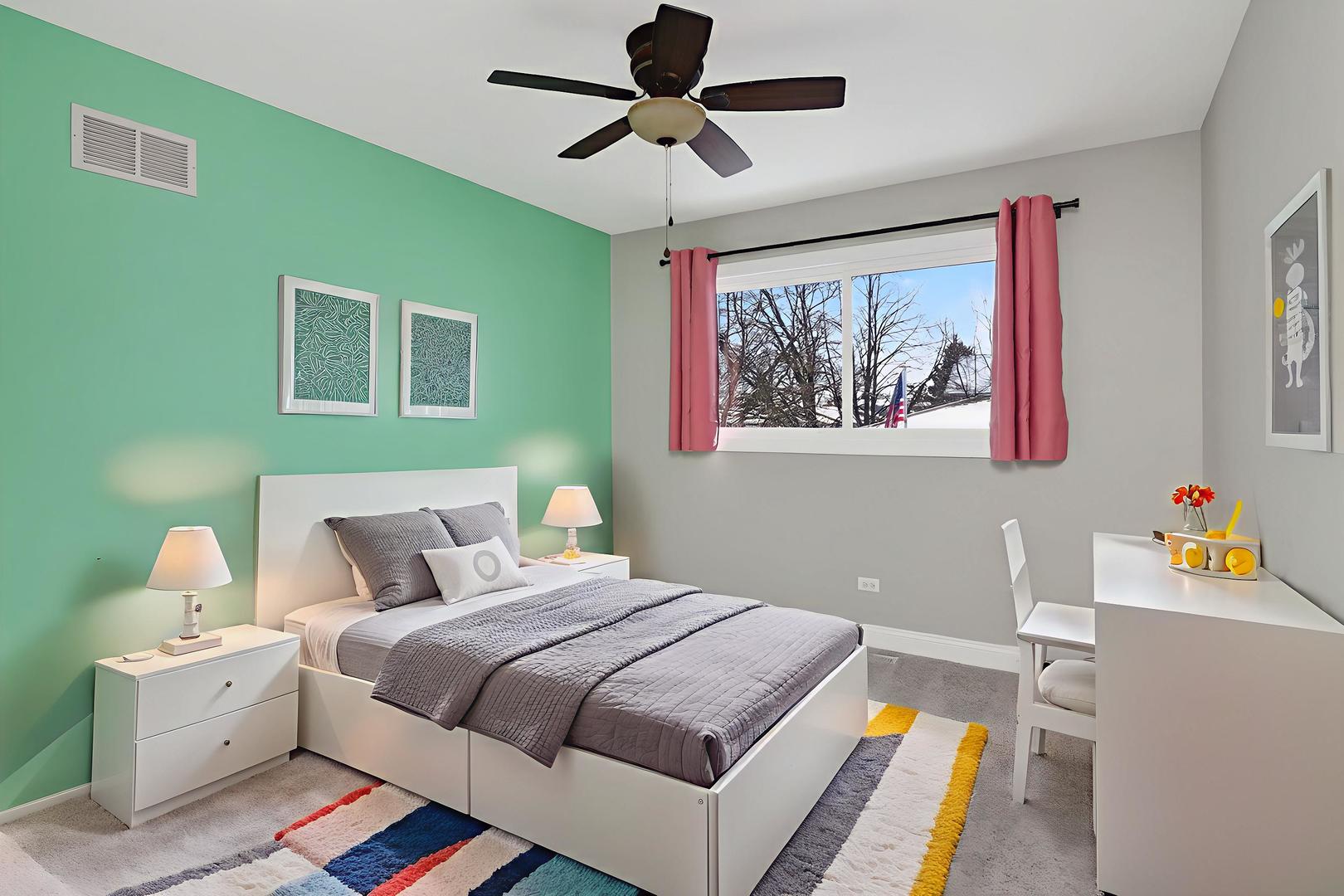 992 Navajo Street Carol Stream, IL 60188 - Photo 11 of 28 a bedroom with a bed and a chandelier