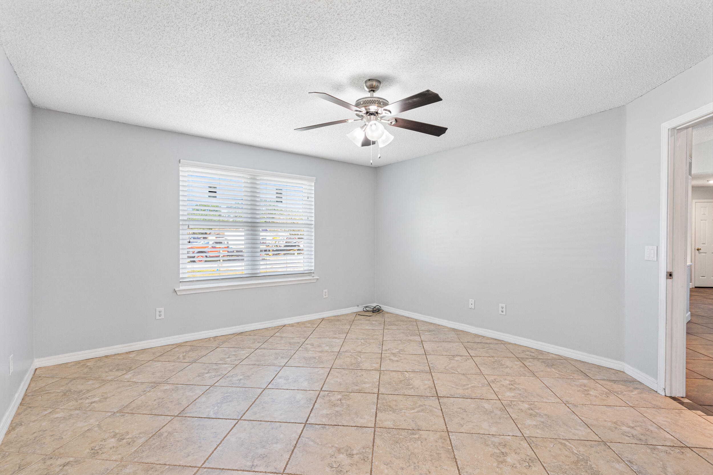 7933 Skyview Boulevard Navarre, FL 32566 - Photo 13 of 38 a view of an empty room with a window