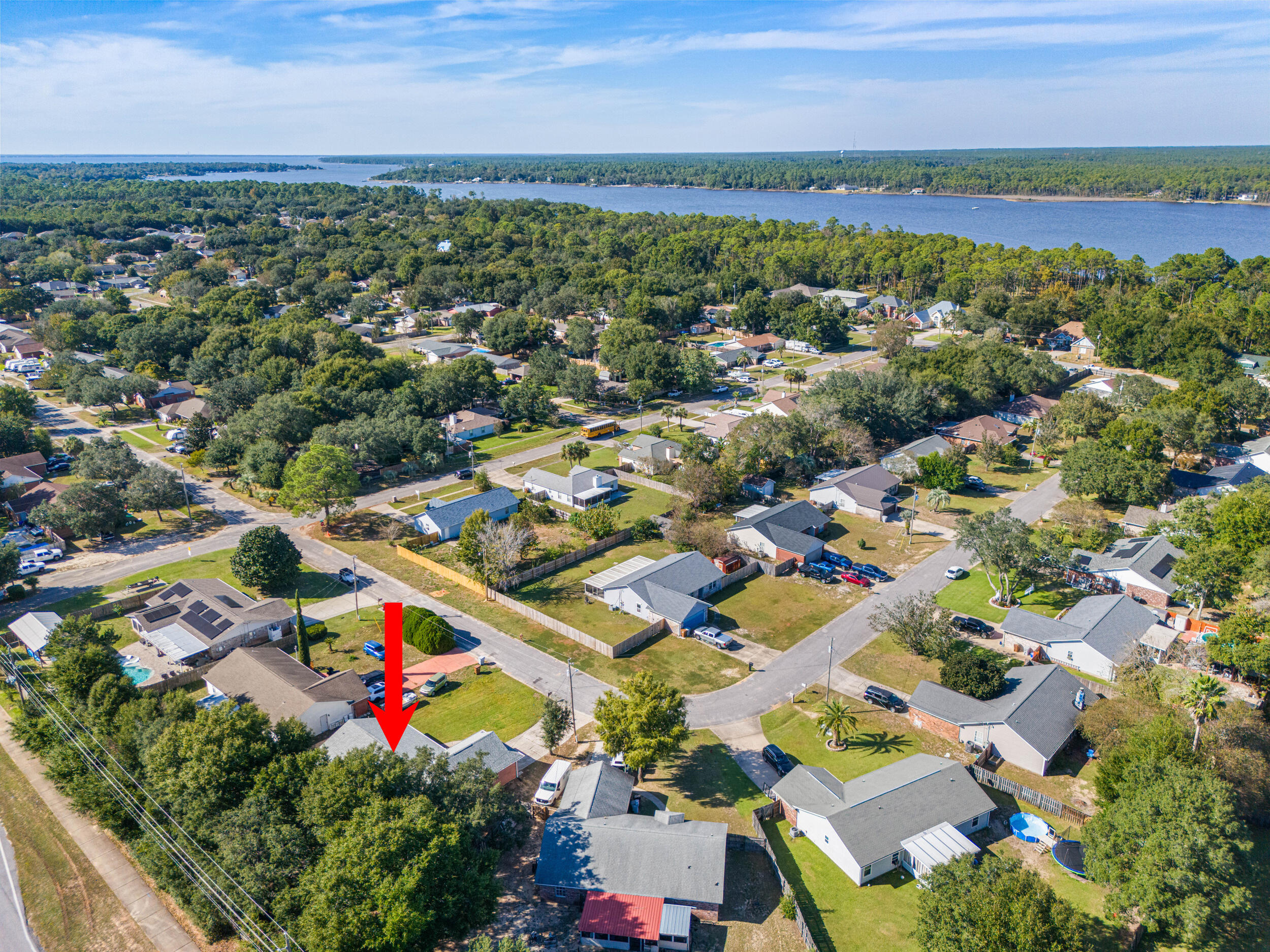 7933 Skyview Boulevard Navarre, FL 32566 - Photo 2 of 38 an aerial view of a city