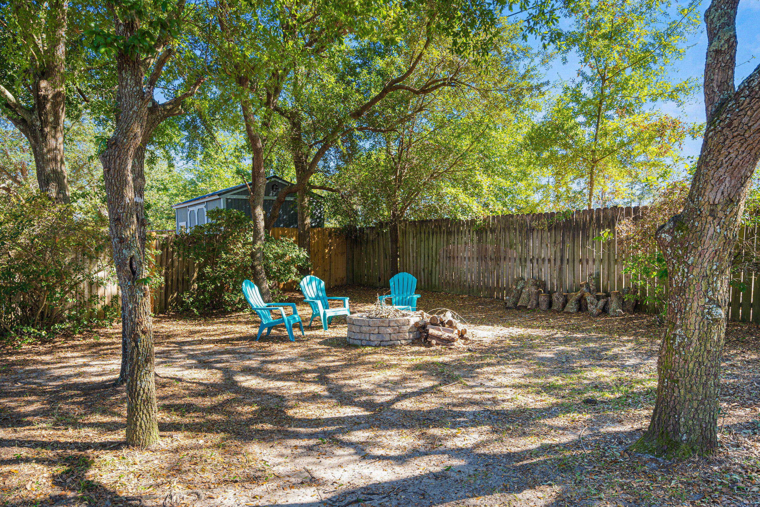 7933 Skyview Boulevard Navarre, FL 32566 - Photo 33 of 38 a view of a outdoor space with a tree