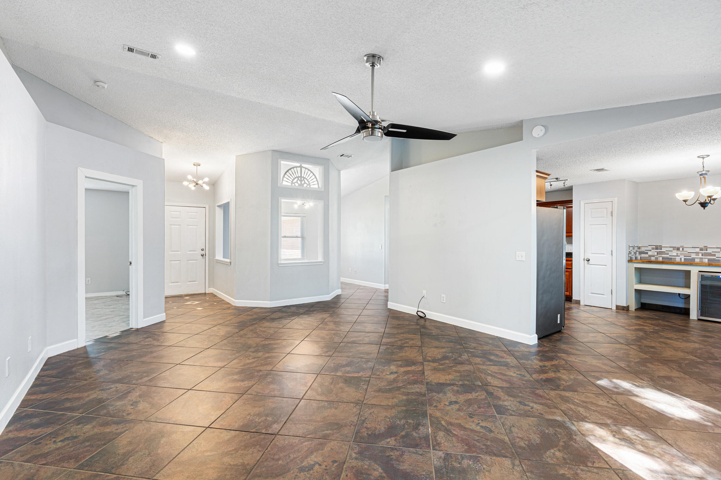 7933 Skyview Boulevard Navarre, FL 32566 - Photo 7 of 38 a view of a kitchen with a sink and cabinets