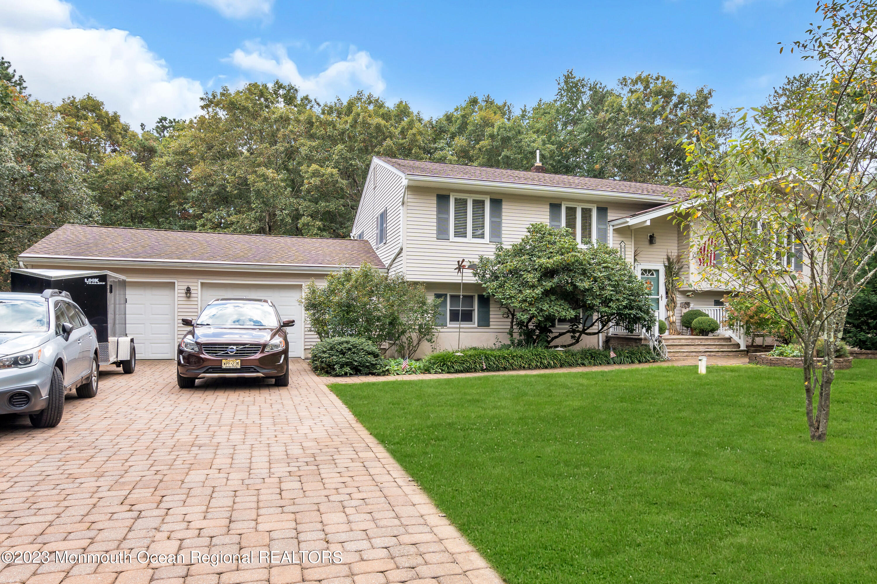 442 Frank Applegate Road Jackson, NJ 08527 - Photo 2 of 88 a front view of a house with garden