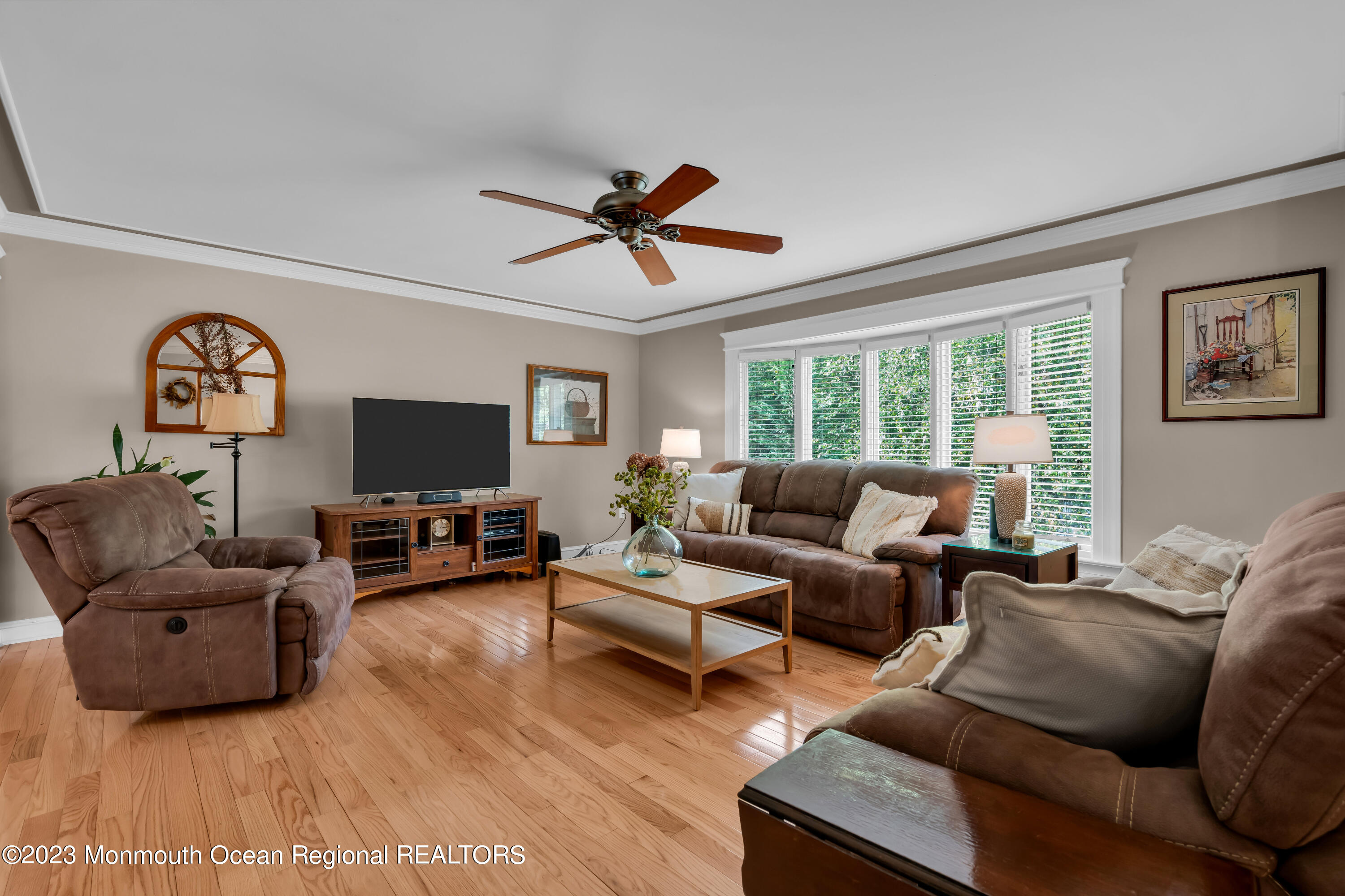 442 Frank Applegate Road Jackson, NJ 08527 - Photo 24 of 88 a living room with furniture a large window and a flat screen tv