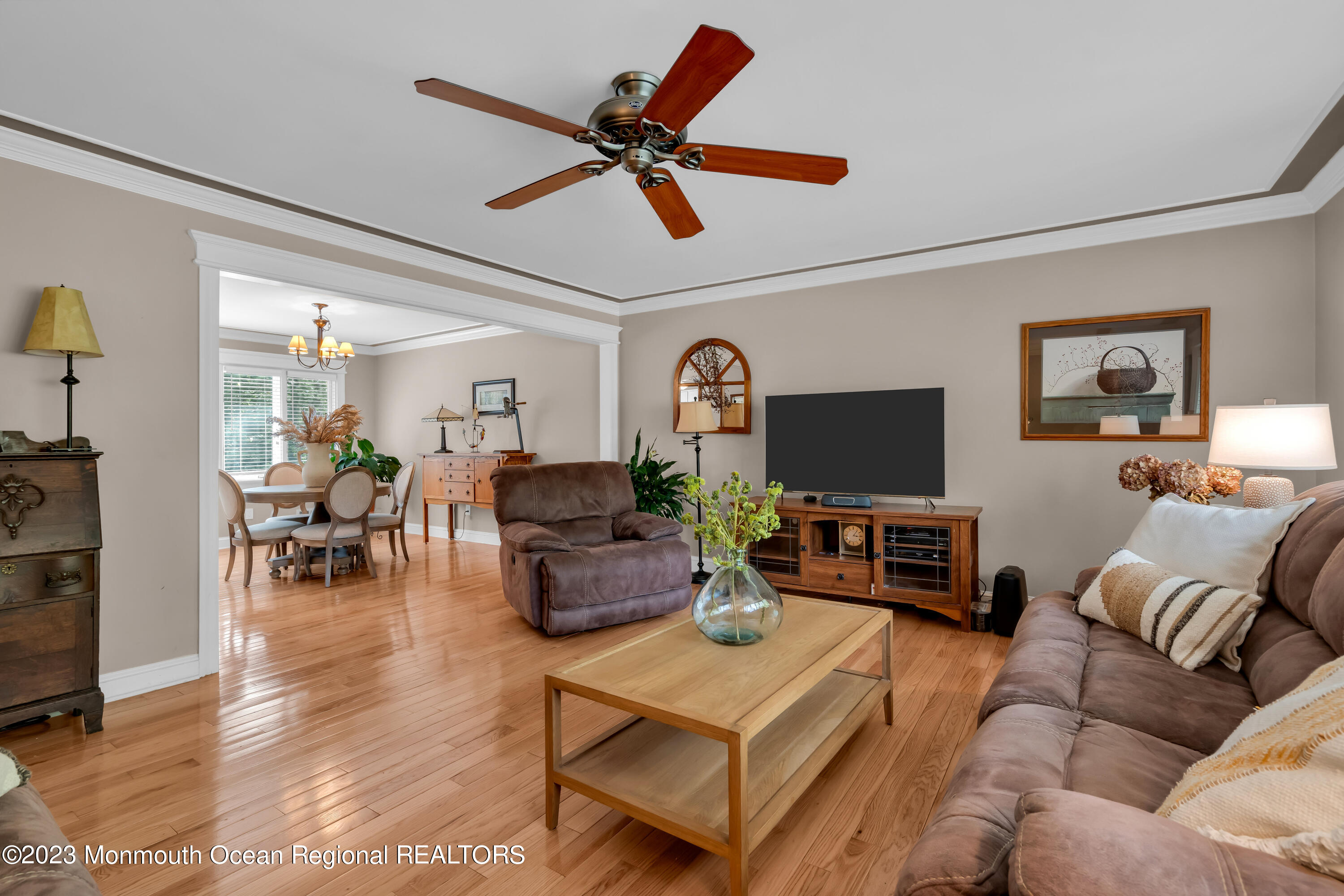 442 Frank Applegate Road Jackson, NJ 08527 - Photo 27 of 88 a living room with furniture and a flat screen tv with wooden floor