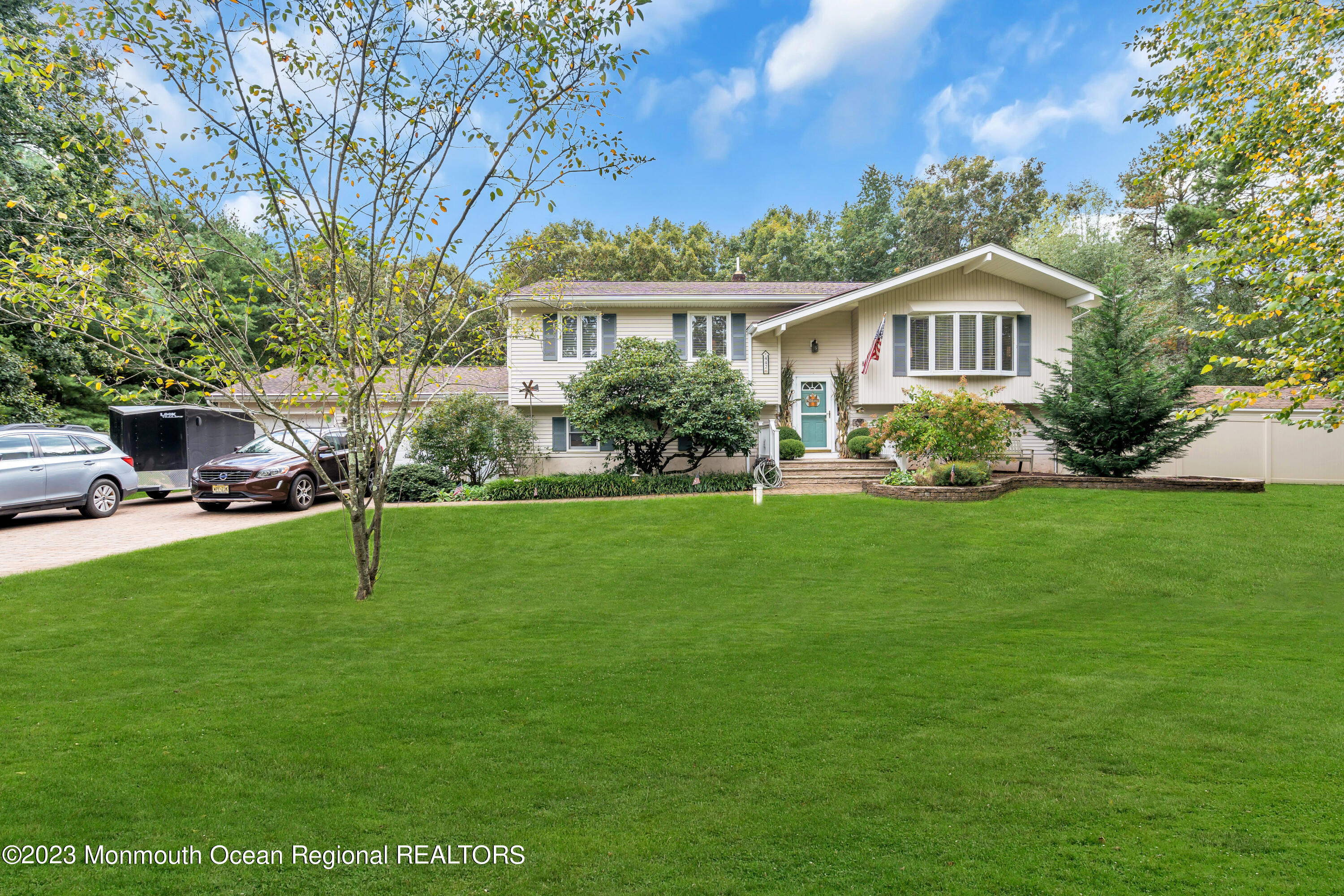 442 Frank Applegate Road Jackson, NJ 08527 - Photo 4 of 88 a front view of a house with a yard