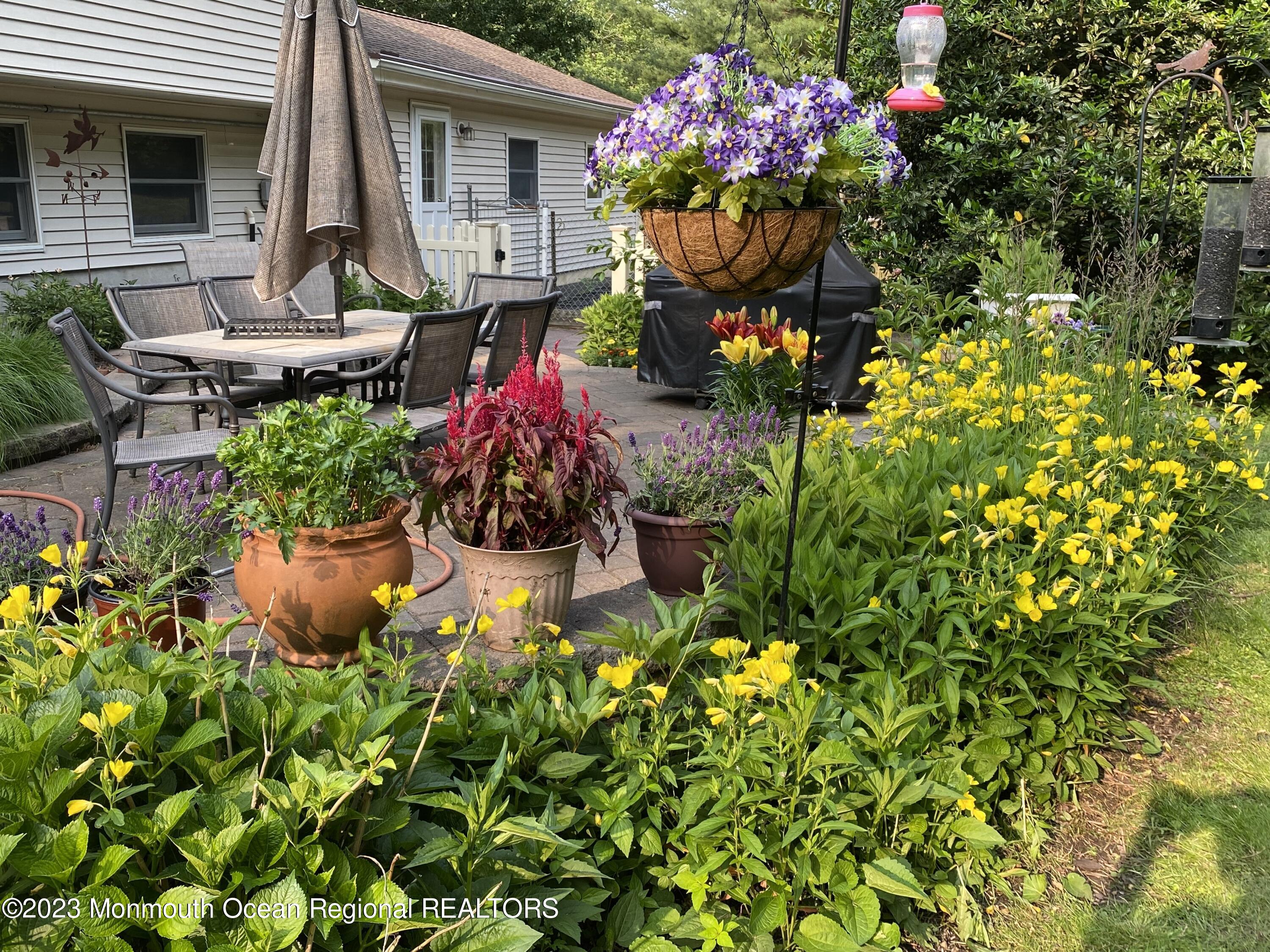 442 Frank Applegate Road Jackson, NJ 08527 - Photo 63 of 88 a front view of a house with a yard and fountain