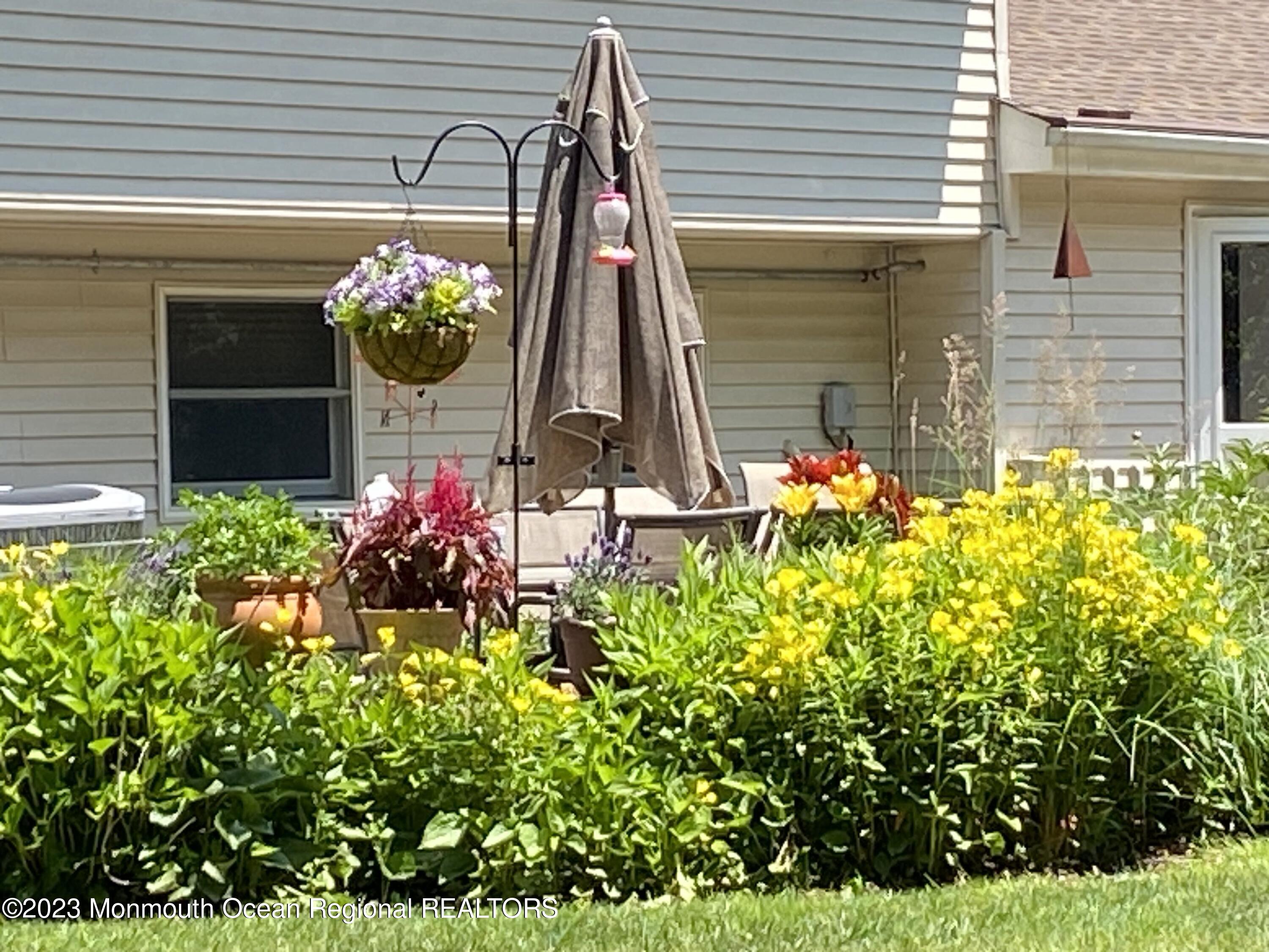 442 Frank Applegate Road Jackson, NJ 08527 - Photo 64 of 88 a front view of a house with a yard and potted plant