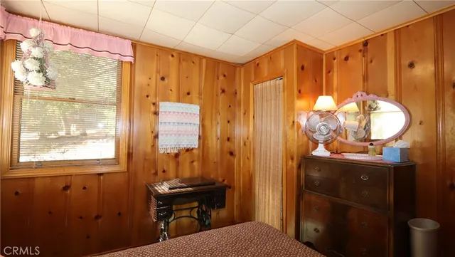 a bathroom with a sink a mirror and a shower