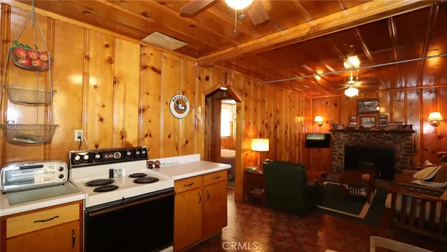 a kitchen with stainless steel appliances a stove and a refrigerator