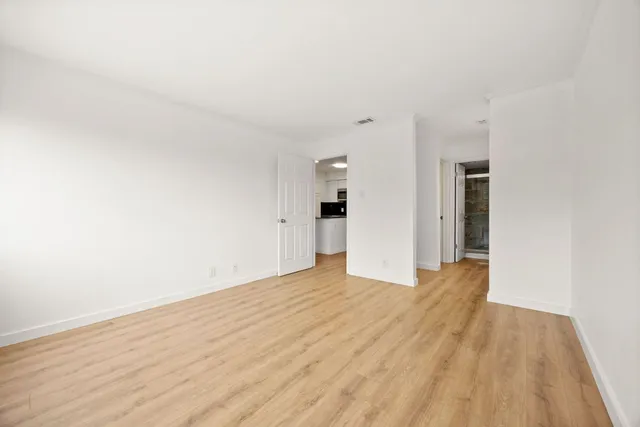 a bathroom with a granite countertop sink mirror and