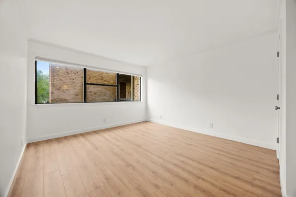 a bed room with a bed and a couch