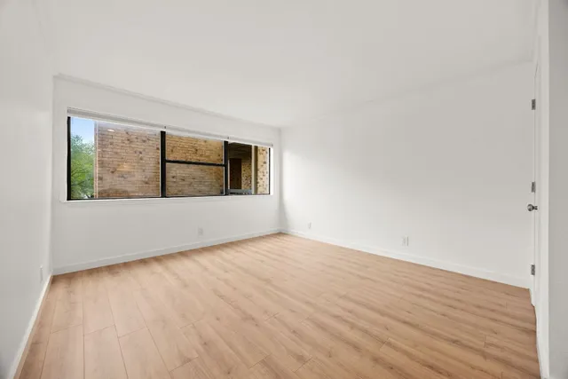 a bed room with a bed and a couch