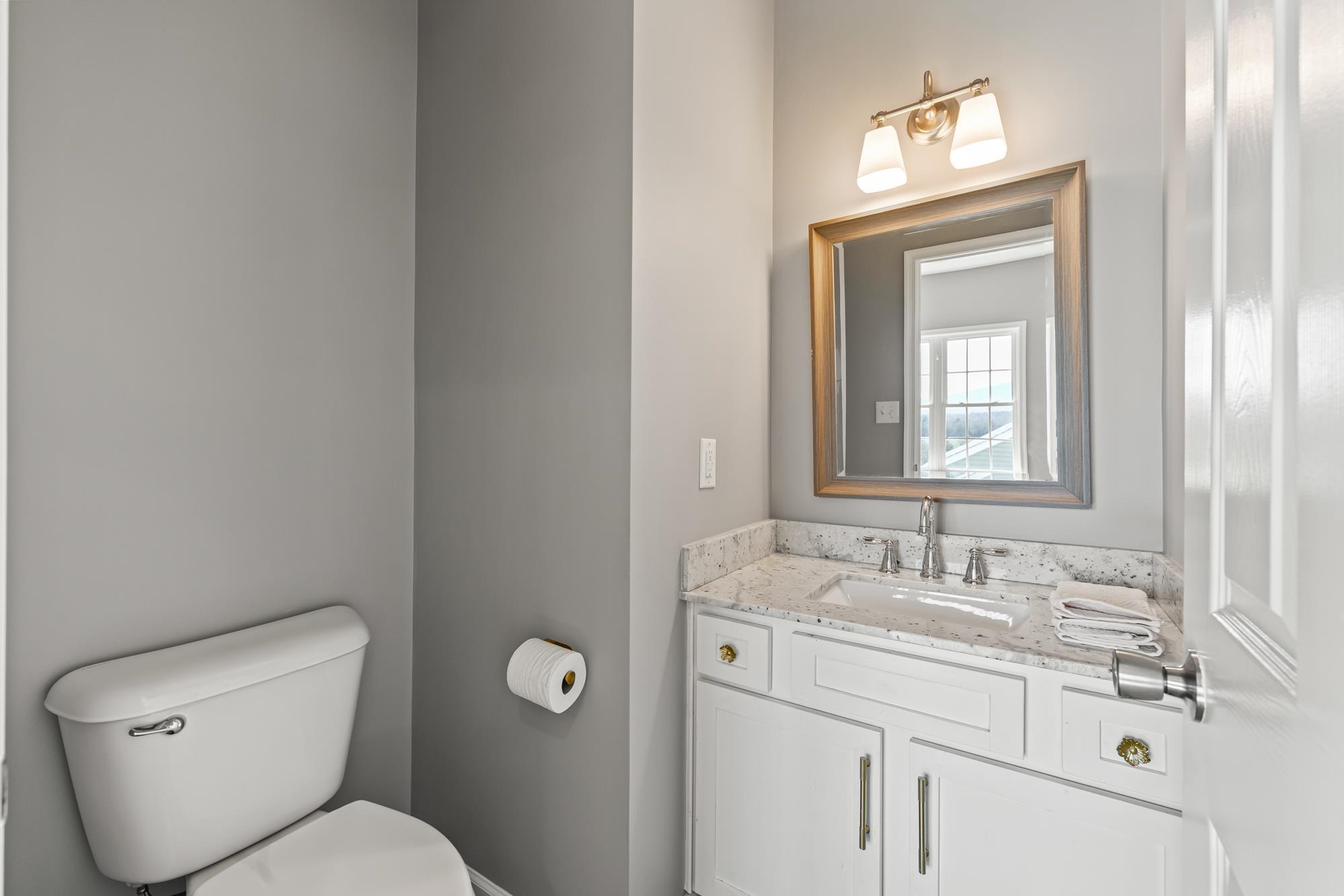 8 Mcilwee Lane Staunton, VA 24401 - Photo 18 of 56 a bathroom with a toilet sink and mirror