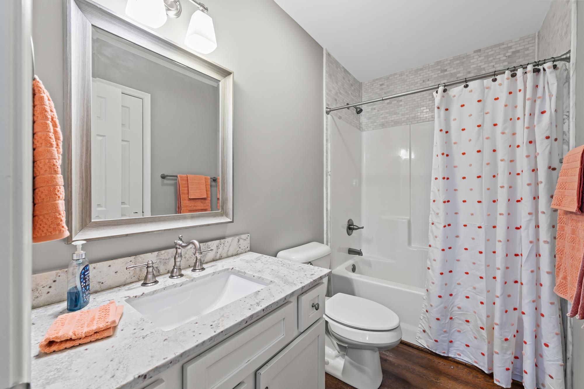 8 Mcilwee Lane Staunton, VA 24401 - Photo 22 of 56 a bathroom with a granite countertop toilet sink and a mirror
