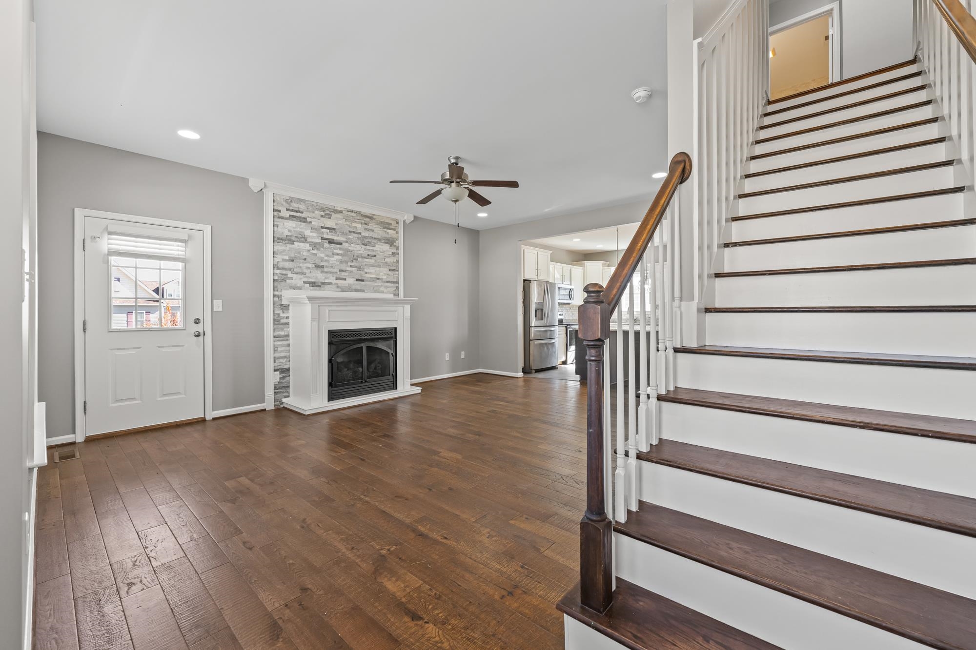 8 Mcilwee Lane Staunton, VA 24401 - Photo 7 of 56 wooden floor in an empty room with a fireplace