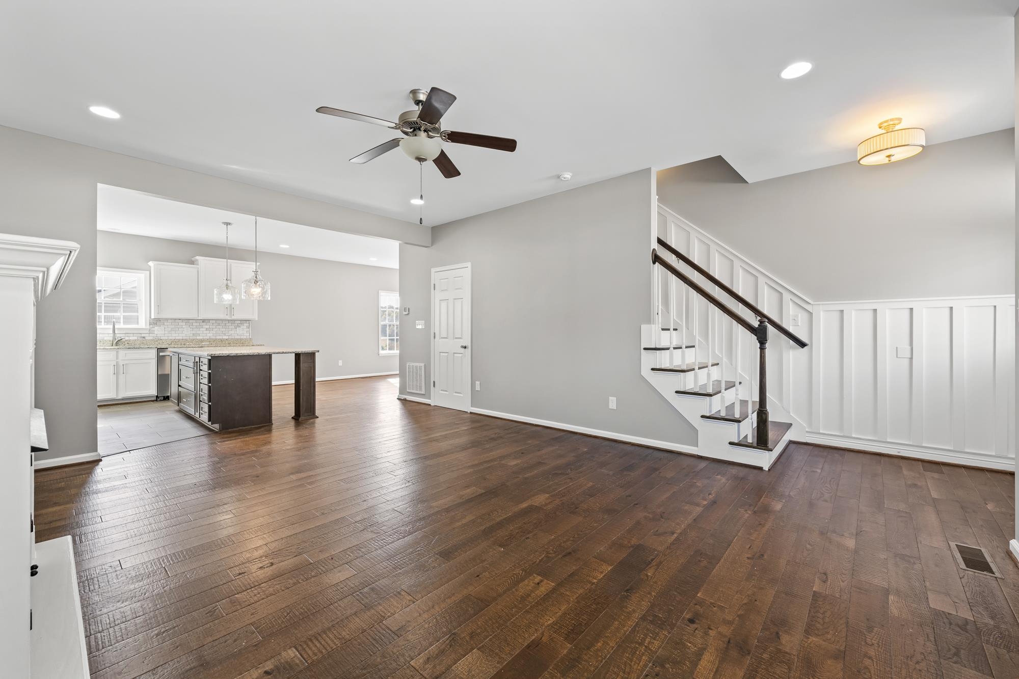 8 Mcilwee Lane Staunton, VA 24401 - Photo 8 of 56 a view of an empty room with wooden floor and a ceiling fan