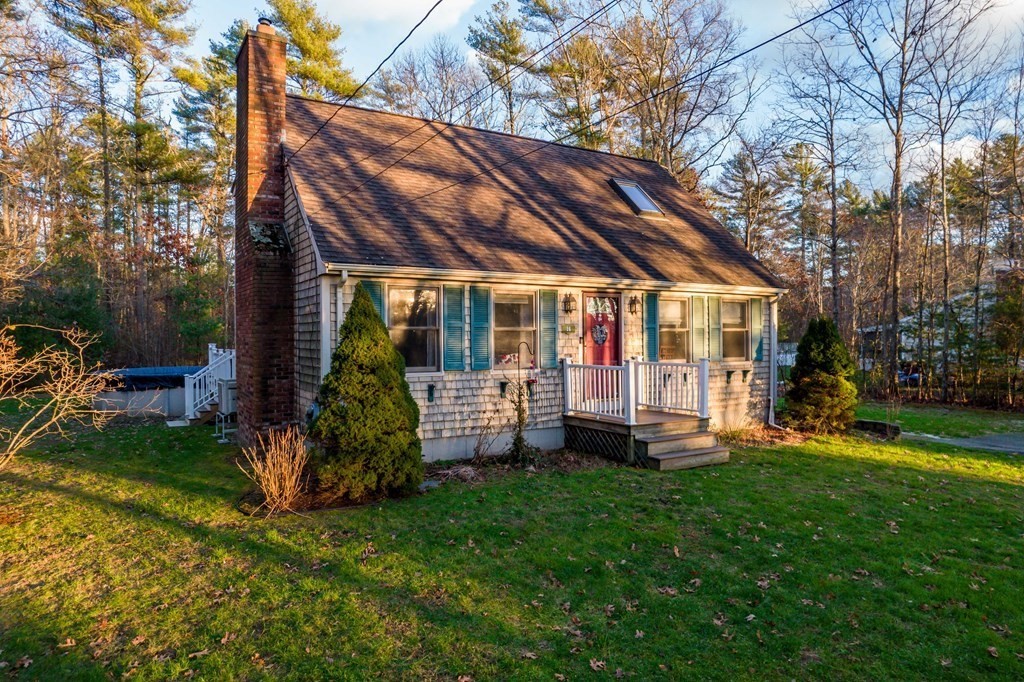 16 Gammons Road Acushnet, MA 02743 - Photo 1 of 31 a front view of a house with garden and porch