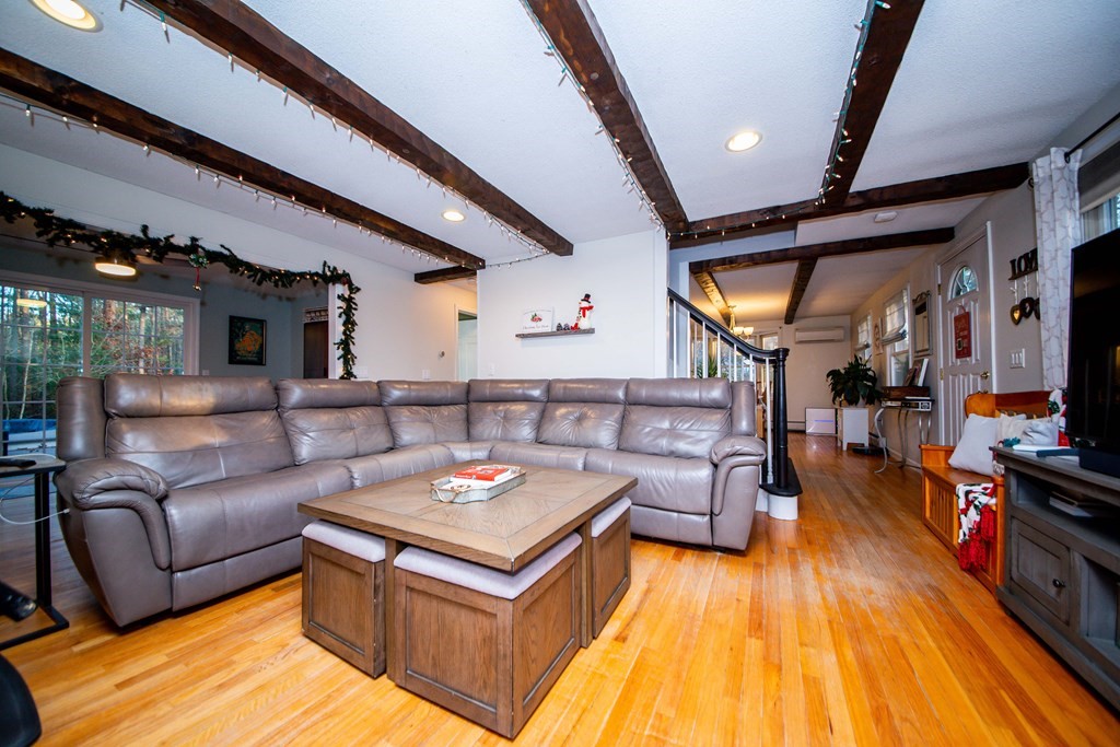 16 Gammons Road Acushnet, MA 02743 - Photo 12 of 31 a living room with furniture and wooden floor