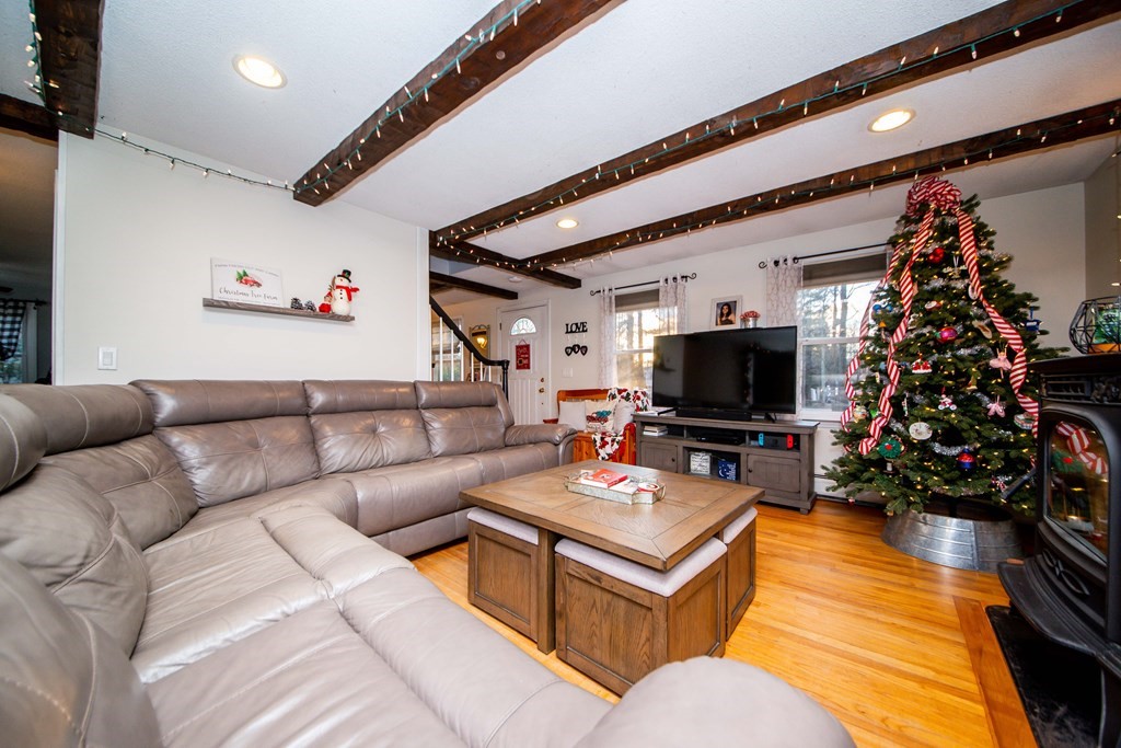 16 Gammons Road Acushnet, MA 02743 - Photo 13 of 31 a living room with furniture and a flat screen tv