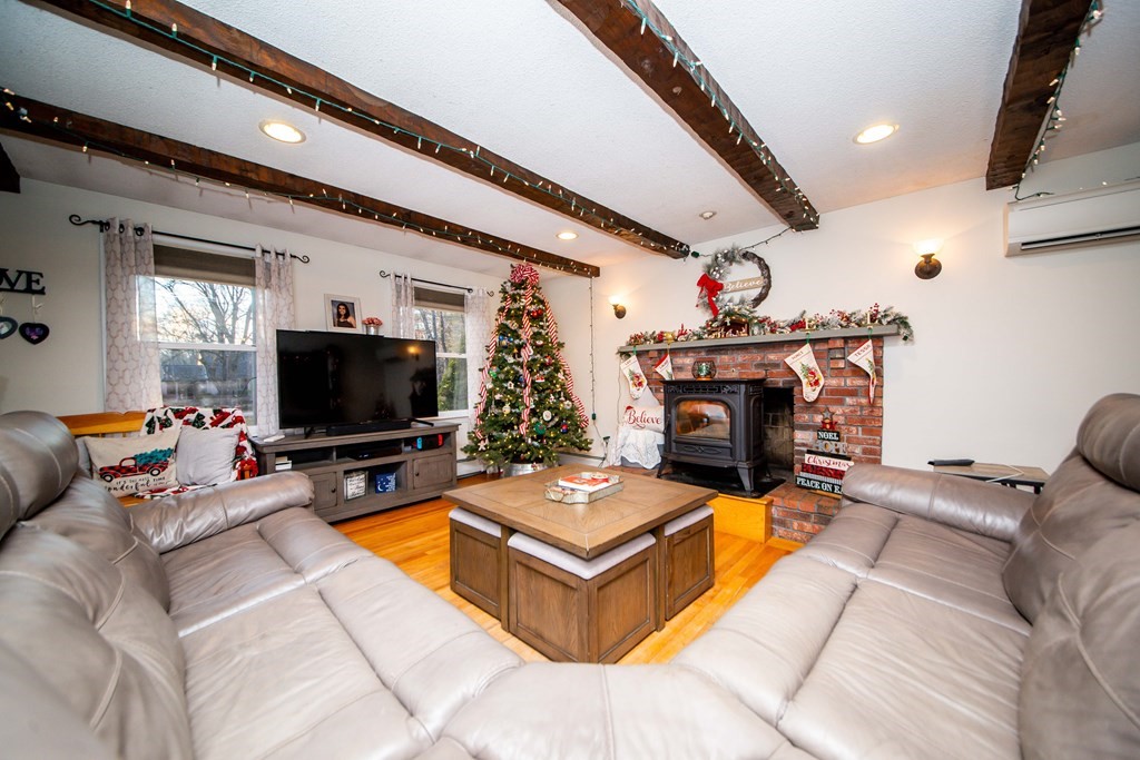 16 Gammons Road Acushnet, MA 02743 - Photo 14 of 31 a living room with furniture and a flat screen tv