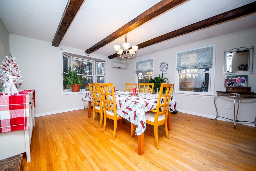 16 Gammons Road Acushnet, MA 02743 - Photo 16 of 31 a dining room with furniture and wooden floor