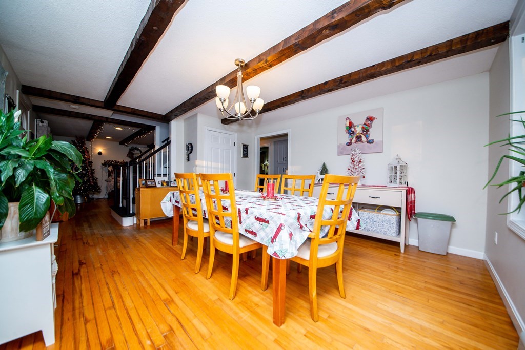 16 Gammons Road Acushnet, MA 02743 - Photo 17 of 31 a dining room with furniture and wooden floor