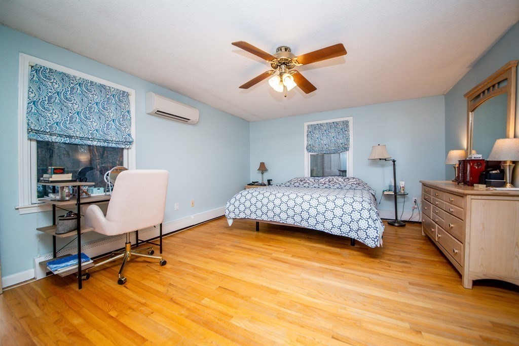 16 Gammons Road Acushnet, MA 02743 - Photo 26 of 31 a bedroom with a bed a table and chair