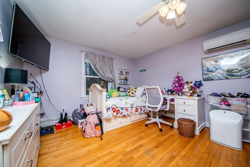 16 Gammons Road Acushnet, MA 02743 - Photo 28 of 31 a bedroom with furniture and a flat screen tv