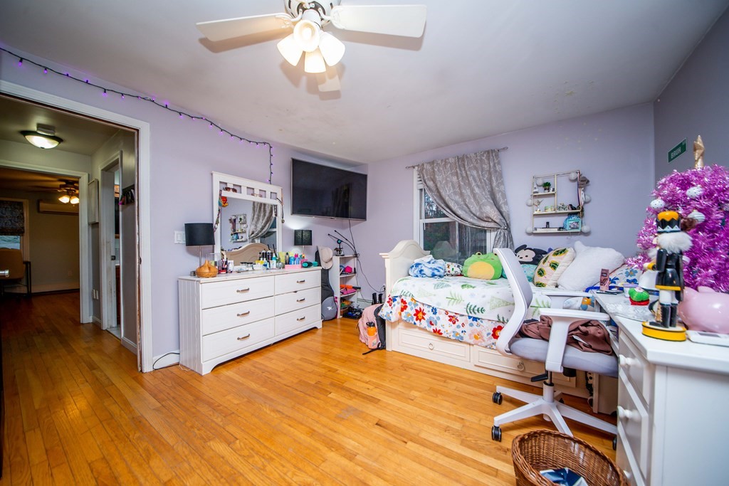16 Gammons Road Acushnet, MA 02743 - Photo 30 of 31 a bed room with furniture and a flat screen tv