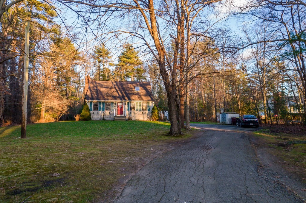16 Gammons Road Acushnet, MA 02743 - Photo 10 of 31 a view of a yard with a tree