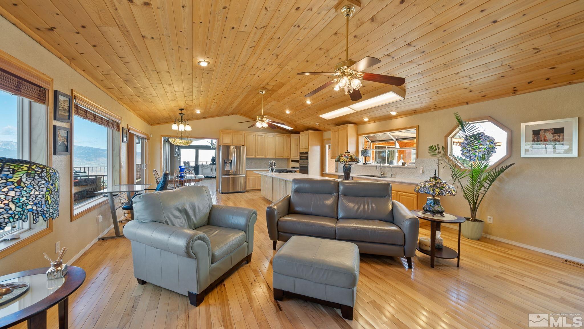 21311 Grande Road Reno, NV 89521 - Photo 13 of 37 a living room with furniture and wooden floor