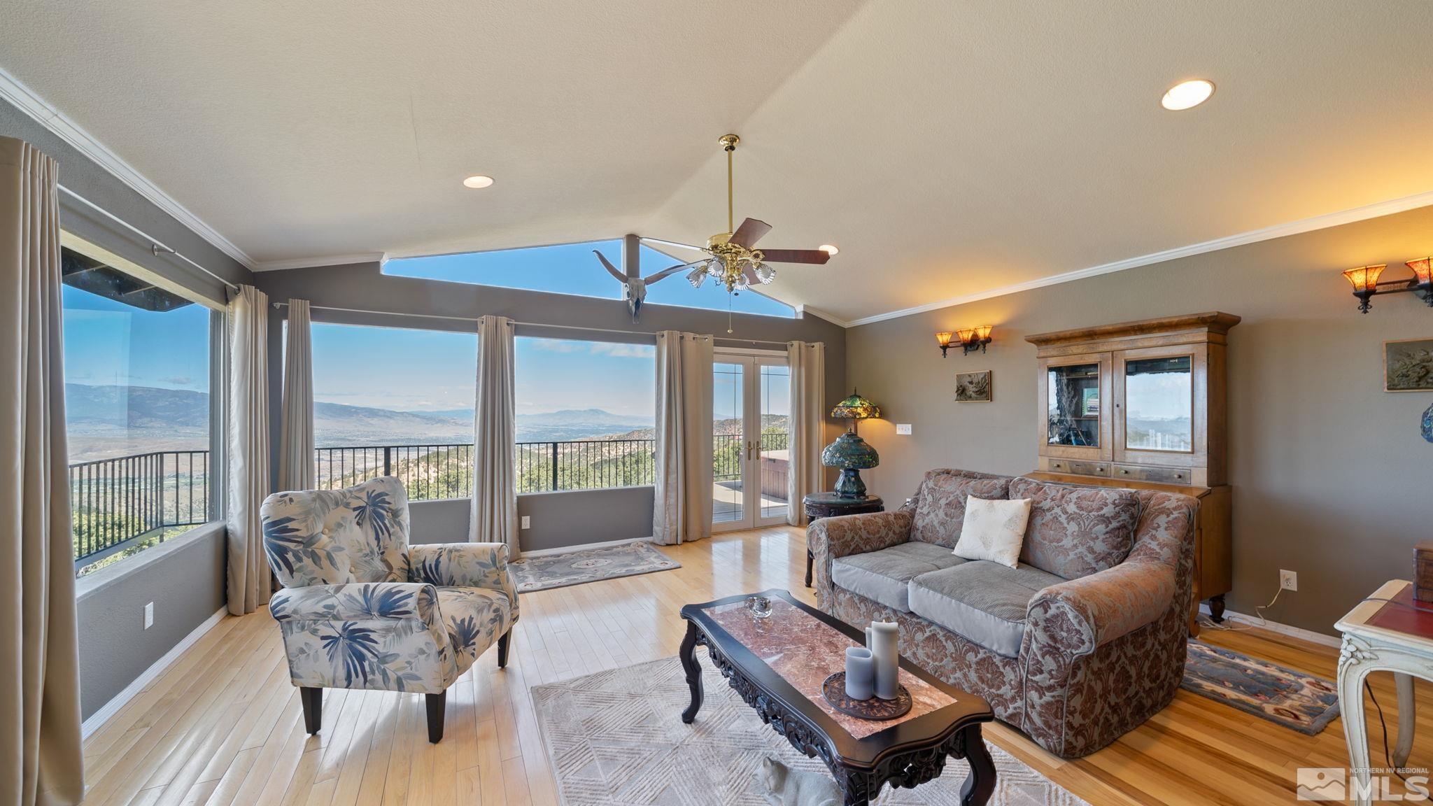 21311 Grande Road Reno, NV 89521 - Photo 8 of 37 a living room with furniture and a large window