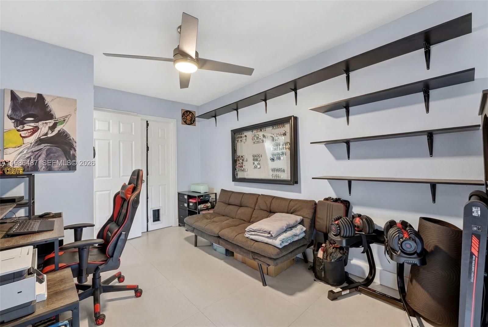 8616 Southwest 103rd Avenue Miami, FL 33173 - Photo 9 of 20 a living room with furniture a air conditioner and a window