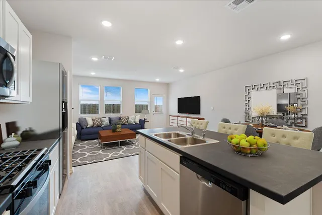 a view of a yard in front view of a house