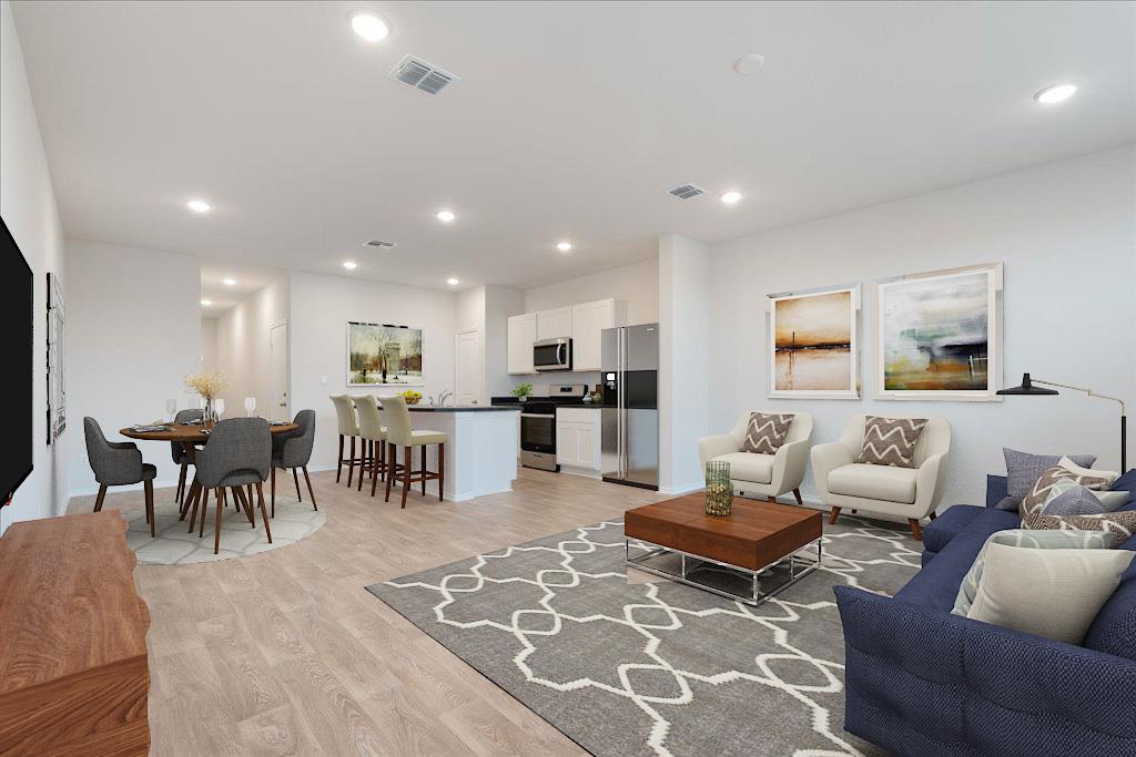 234 Jackson Drive Maxwell, TX 78656 - Photo 3 of 15 a living room with furniture and kitchen view
