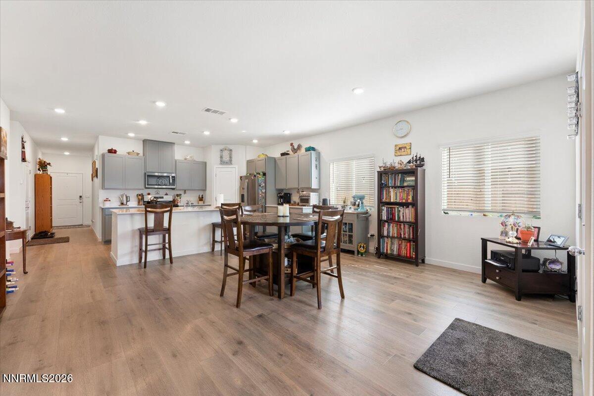 809 Egan Canyon Road Dayton, NV 89403 - Photo 20 of 51 a view of a dining room with furniture and wooden floor