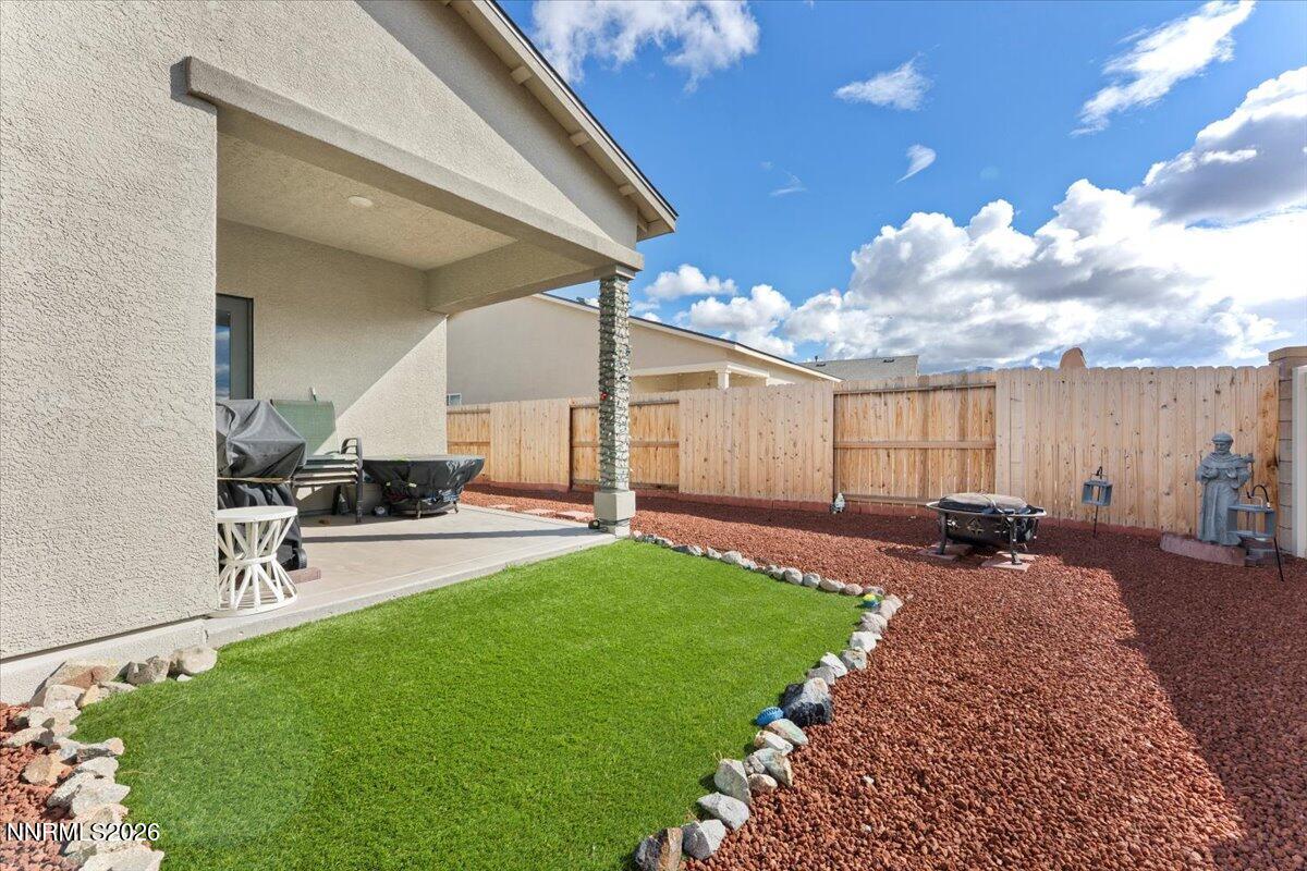 809 Egan Canyon Road Dayton, NV 89403 - Photo 45 of 51 a view of a backyard with sitting area