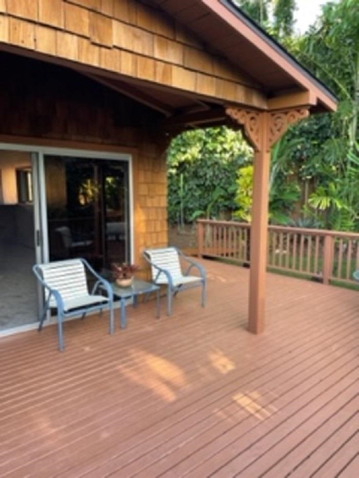 321 West Kuiaha Road Haiku, HI 96708 - Photo 1 of 27 a view of a patio with a table and chairs