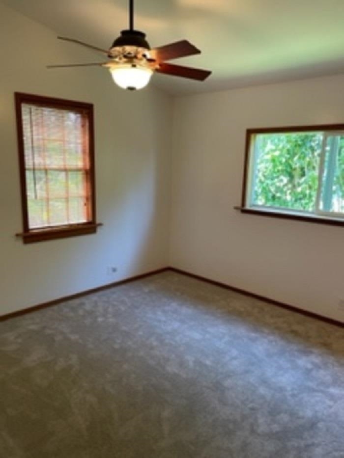 321 West Kuiaha Road Haiku, HI 96708 - Photo 17 of 27 an empty room with a window