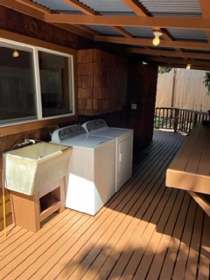321 West Kuiaha Road Haiku, HI 96708 - Photo 9 of 27 a view of balcony and wooden floor