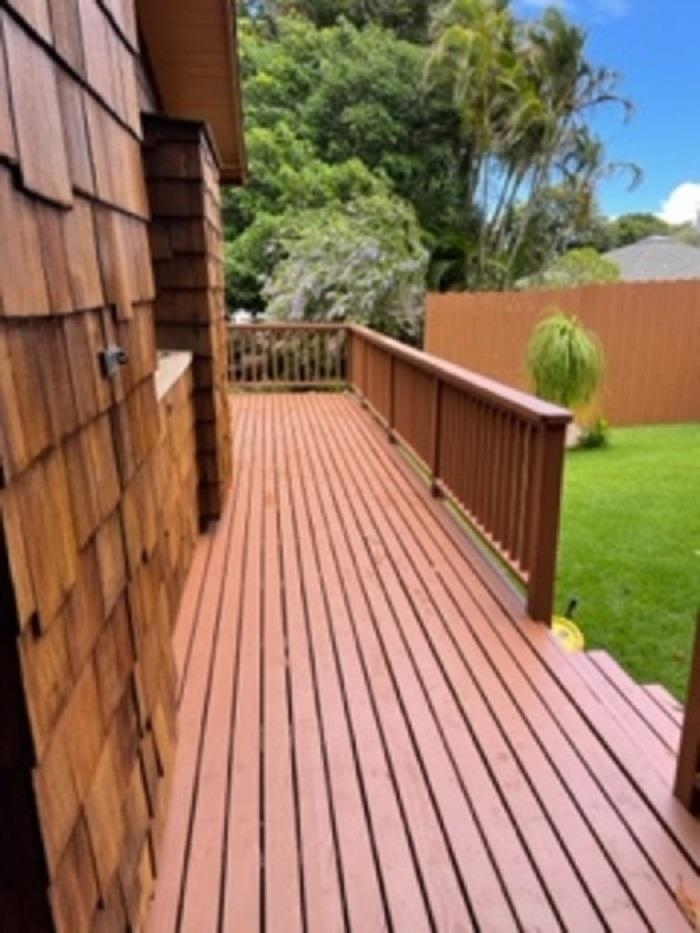 321 West Kuiaha Road Haiku, HI 96708 - Photo 10 of 27 a view of balcony with wooden floor and fence