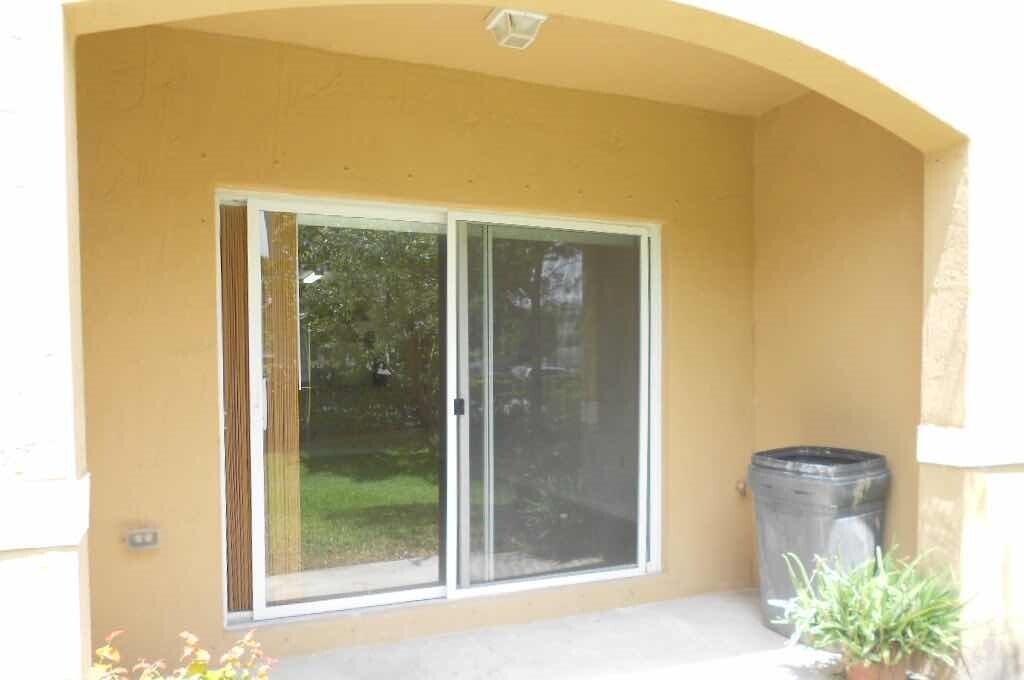 5914 Riverside Avenue Tamarac, FL 33321 - Photo 11 of 12 Covered Patio