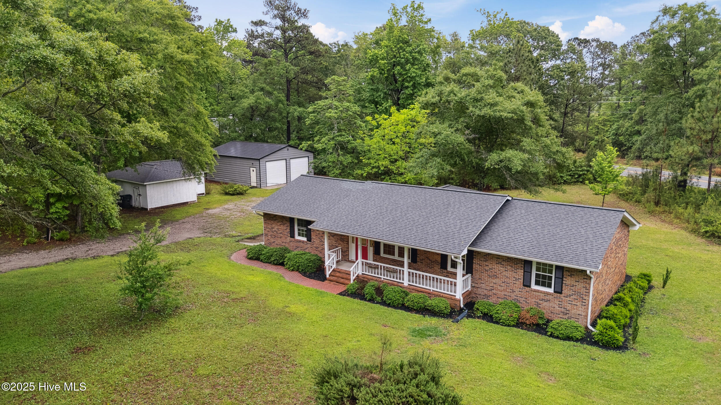 687 Holly Ridge Road Holly Ridge, NC 28445 - Photo 1 of 44 33_dji_20250512164957_0007_d