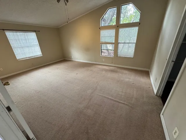 an empty room with windows