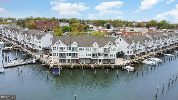 a view of a lake with building in front of it