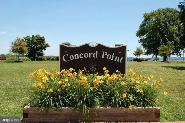a view of a sign board with an ocean view